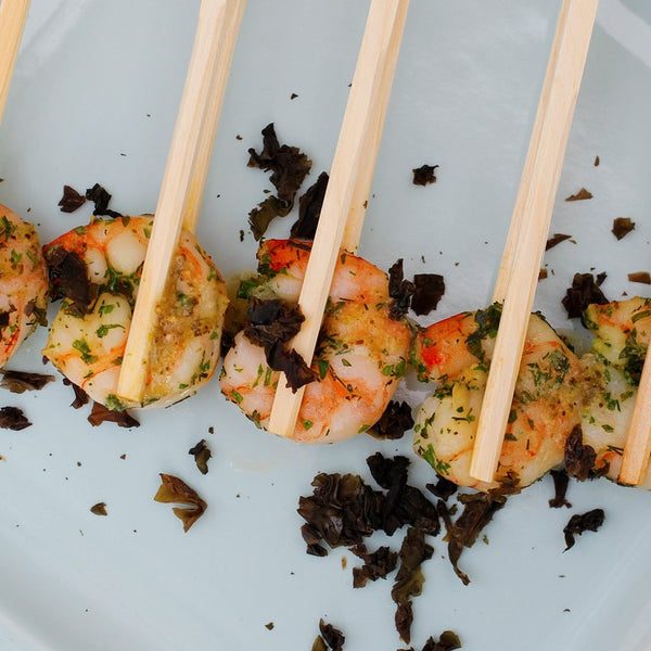 Prawns in Chopsticks with Lime Wasabi Dressing and Karengo Fronds
