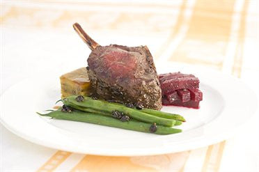 Venison Racks with Lemon and Peppercorn Paste and Olive Oil Enriched Jus 